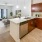 wide, c-shaped kitchen with open countertop